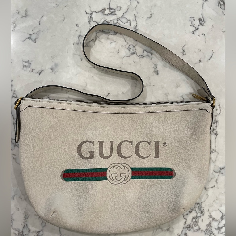GUCCI half moon hobo bag with vintage GUCCI name logo.